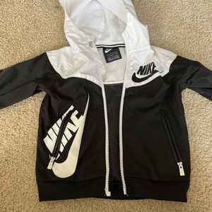 Child's black and white Nike wind breaker.
